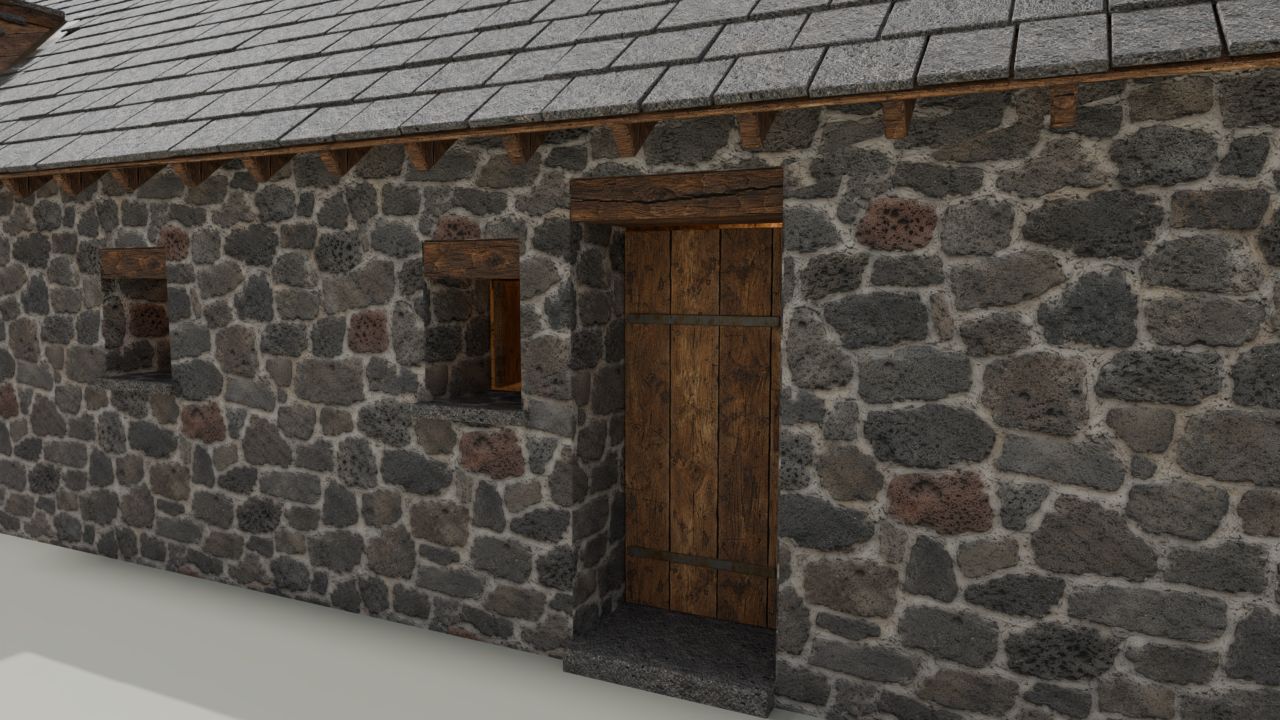 The cottage front door in a stone wall